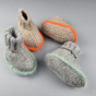 Strickanleitung Baby Booties mit Kontrastreif an der Sohle